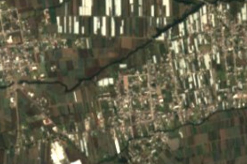 Satellite view of Analco de Ponciano Arriaga among farm fields at the foot of the Sierra Nevada, Puebla