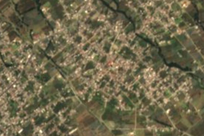 Vista satelital de Santa Isabel Tepetzala, una retícula densa de calles y solares al oriente de Acajete, Puebla