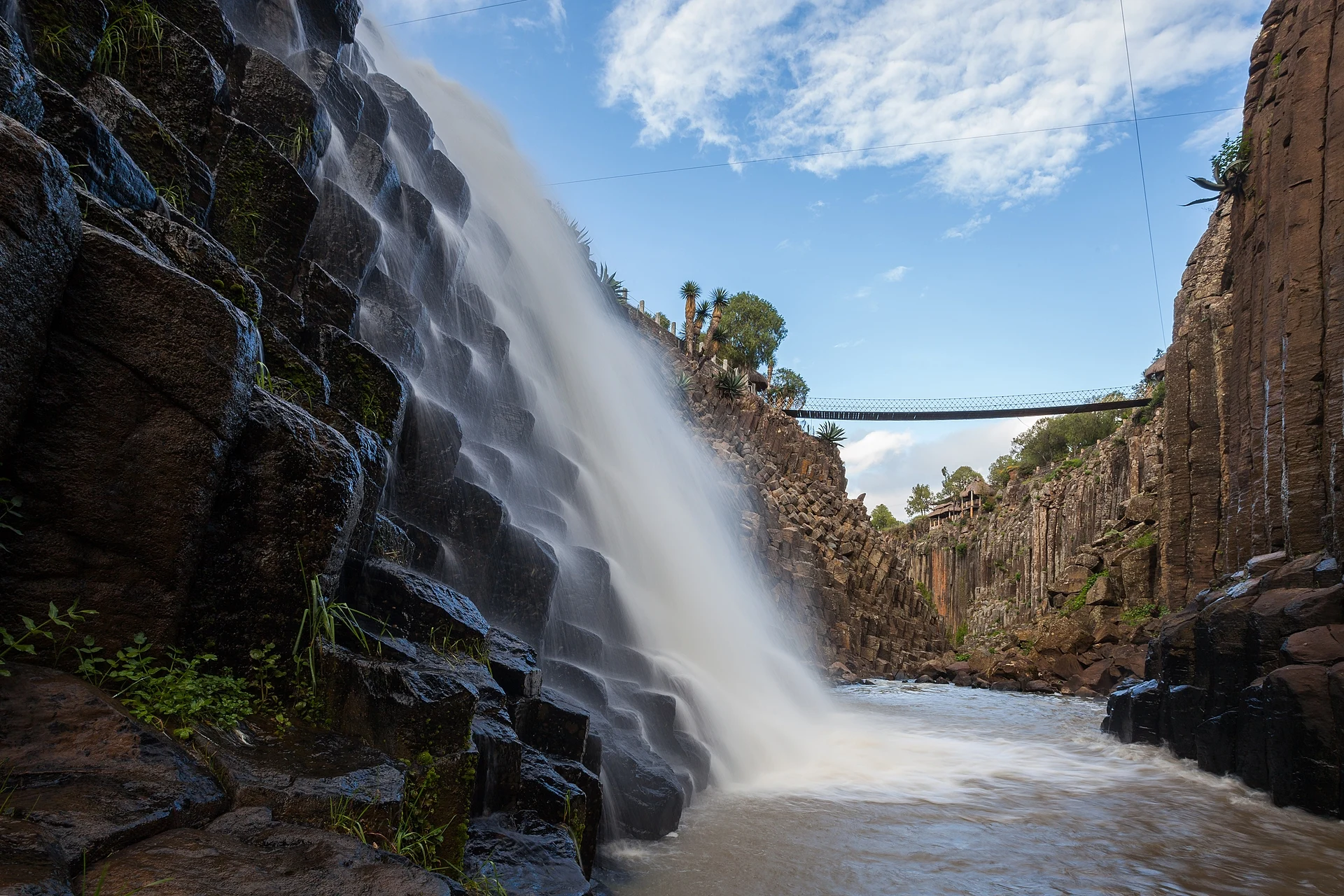 Waterfall pouring over the basalt columns of the Prismas Basálticos, Huasca, Hidalgo