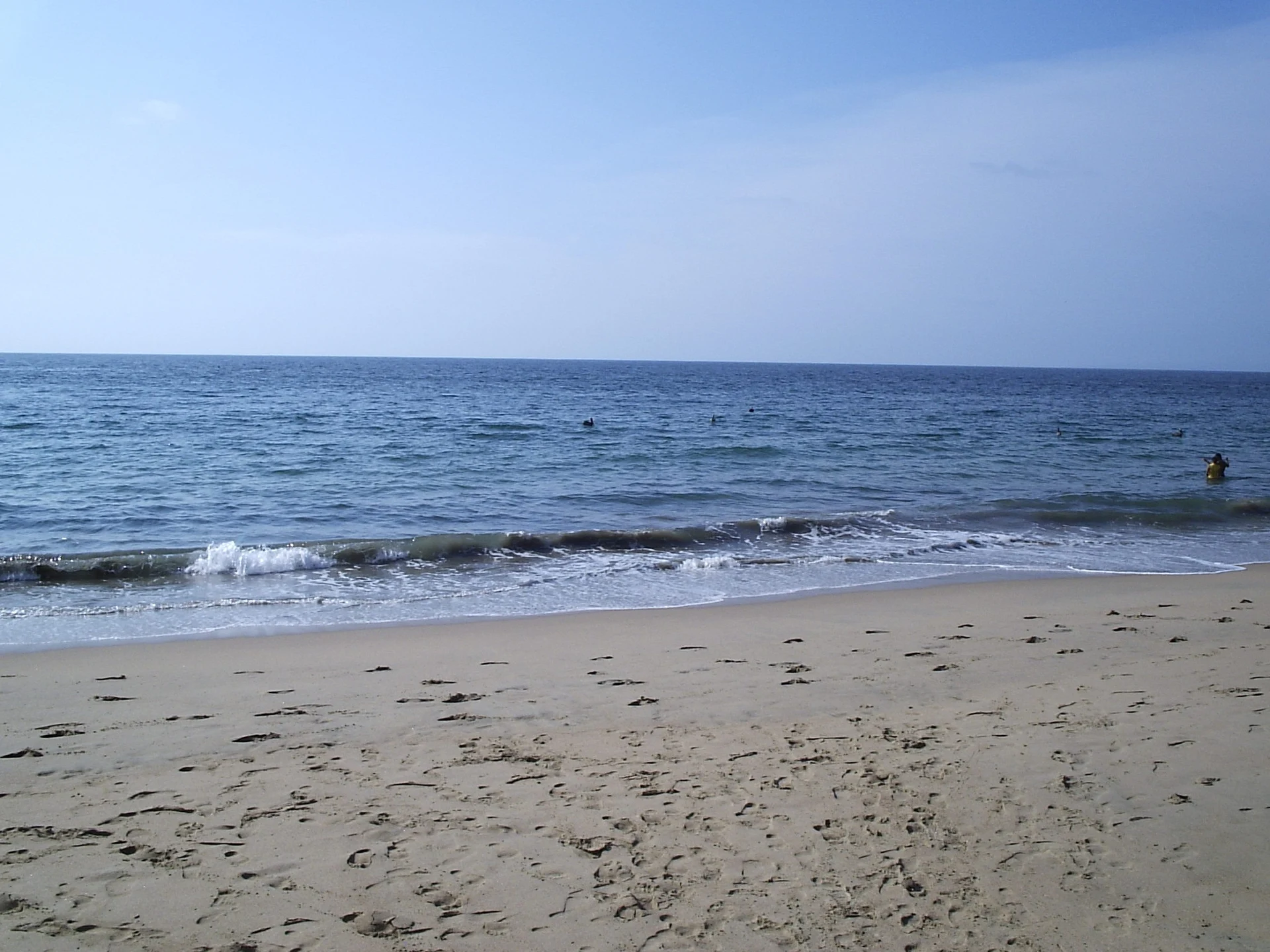 Sand and gentle surf at the north end of La Peñita's beach, on the same stretch of Jaltemba Bay that runs on to El Naranjo, Playa El Naranjo, Nayarit