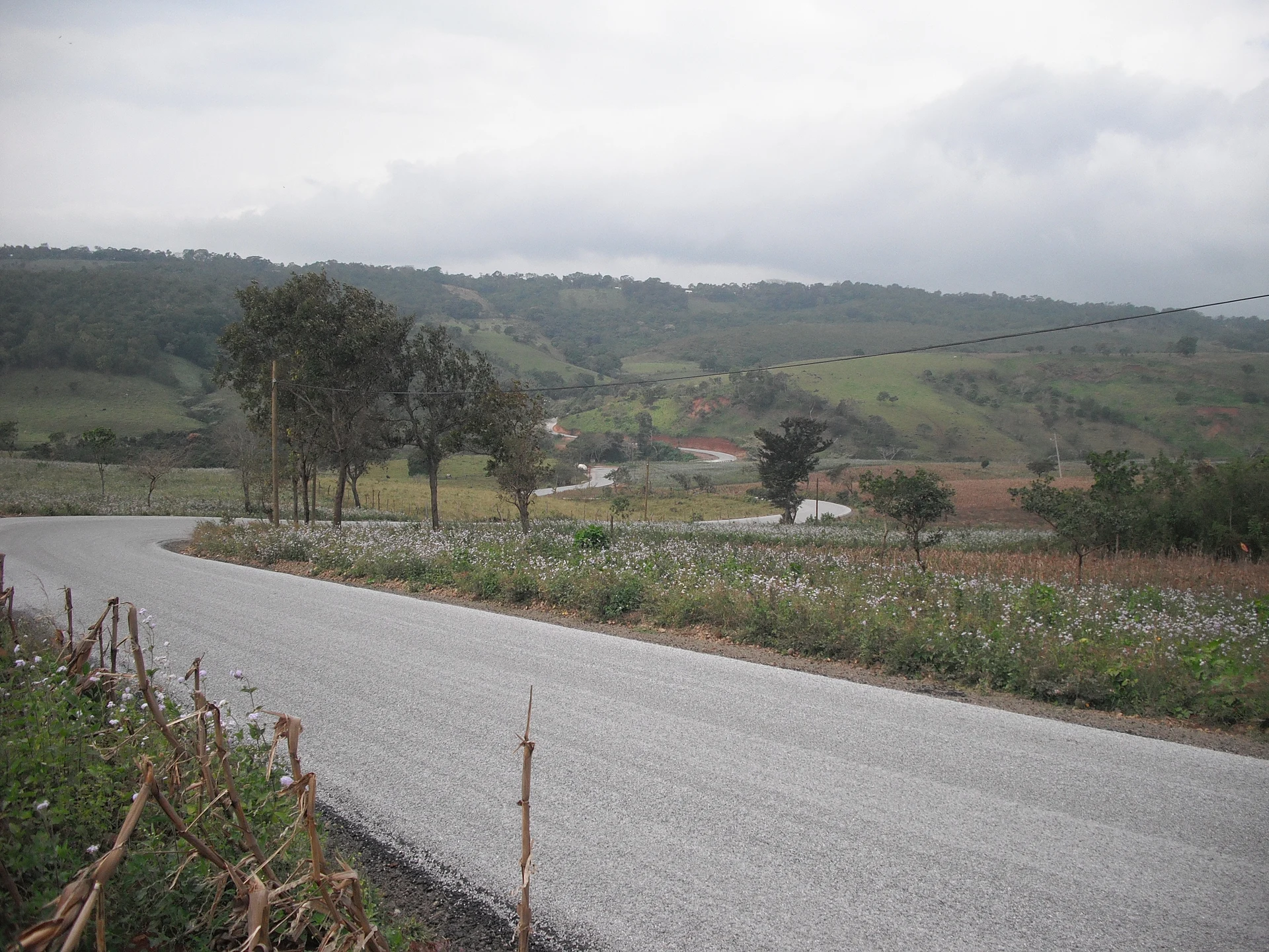 Green hills along the paved road west of Soteapan, in Soteapan municipality, Veracruz